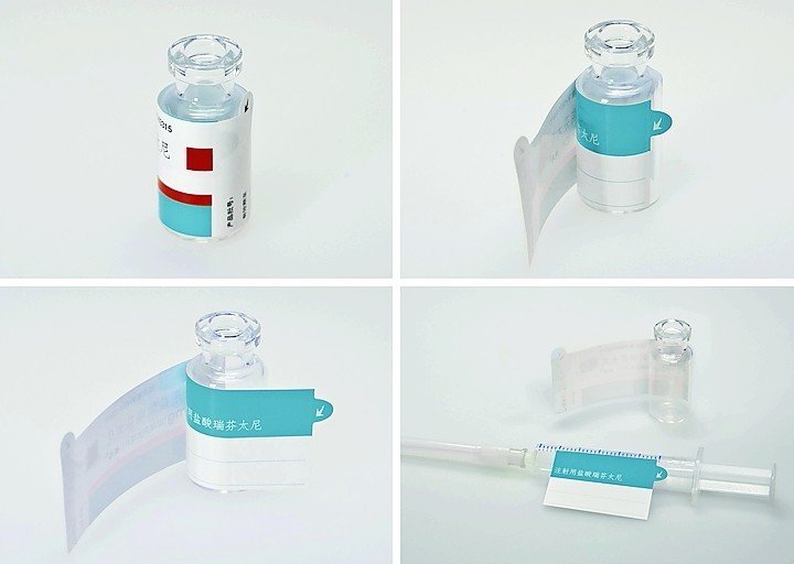 Innovatives Label mit selbstaufrichtender Anfasslaschepasst auf kleine Vials