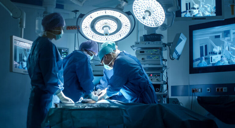 Medical_Team_Performing_Surgical_Operation_in_Modern_Operating_Room